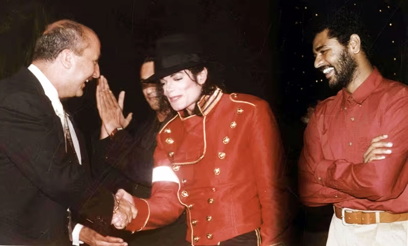Michael Jackson meets Anupam kher and Prabhudeva is in the background 